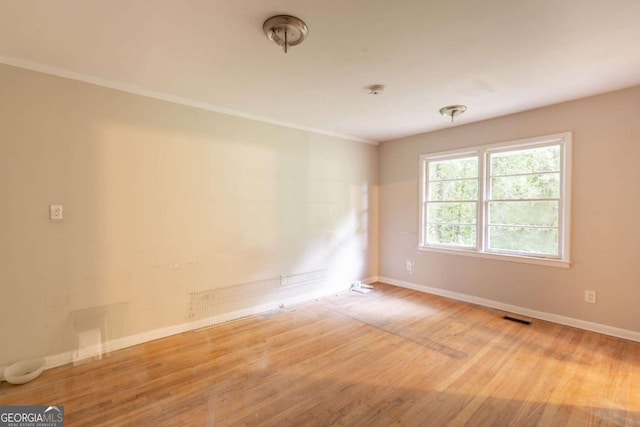 4201 Hicks Rd, Austell, GA 30106 - spare room with baseboards and wood finished floors