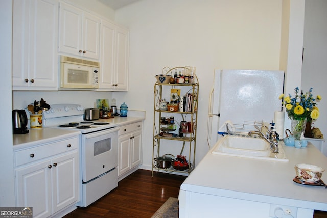 2887 Florence Dr, Gainesville, GA 30504 - kitchen with white appliances, dark wood-type flooring, light countertops, and white cabinetry