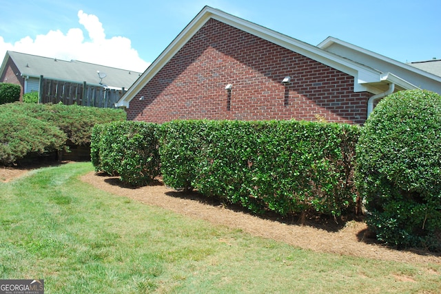 2887 Florence Dr, Gainesville, GA 30504 - view of property exterior featuring brick siding and a yard