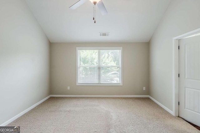 2317 Church St, Hampton, GA 30228 - spare room featuring carpet flooring, vaulted ceiling, and a ceiling fan