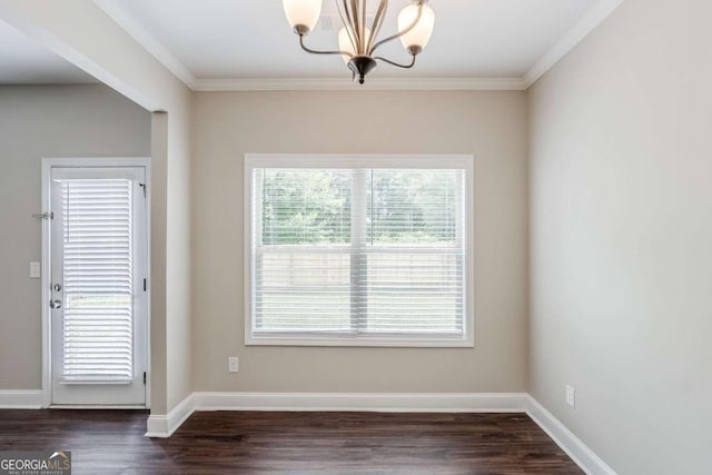 2317 Church St, Hampton, GA 30228 - empty room featuring crown molding, a chandelier, and dark wood-style flooring