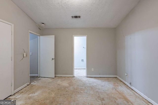 5856 Rock Rd, Union City, GA 30291 - unfurnished room featuring vaulted ceiling and a textured ceiling