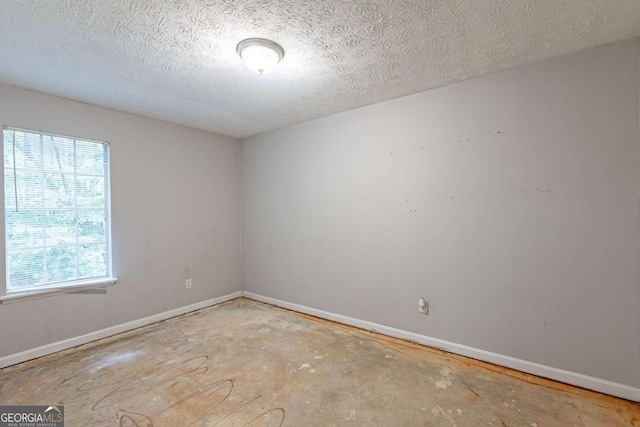 5856 Rock Rd, Union City, GA 30291 - full bathroom with tub / shower combination and a textured ceiling