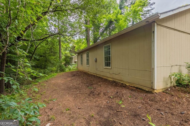 5856 Rock Rd, Union City, GA 30291 - spare room with a textured ceiling and unfinished concrete flooring