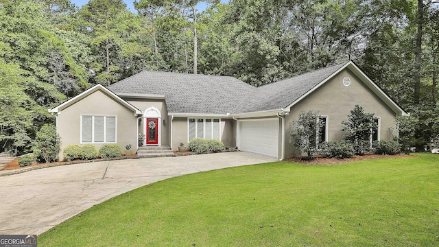 118 Whitfield Run, Peachtree City, GA 30269 - ranch-style home with concrete driveway, stucco siding, a front lawn, and a garage