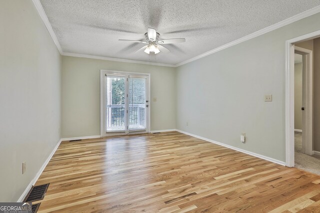 118 Whitfield Run, Peachtree City, GA 30269 - spare room featuring ceiling fan, light wood-style flooring, a textured ceiling, and ornamental molding