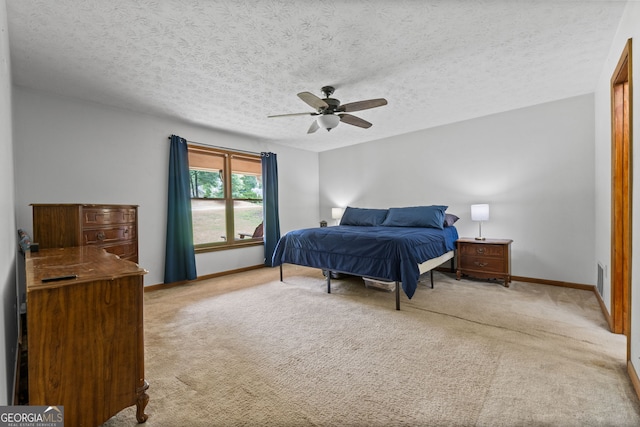 1290 Shadowlawn Dr NE, Conyers, GA 30012 - carpeted bedroom with a textured ceiling and a ceiling fan