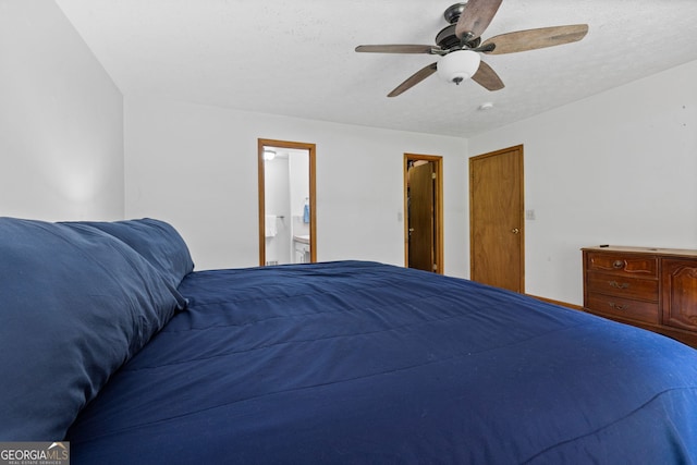1290 Shadowlawn Dr NE, Conyers, GA 30012 - bedroom with ensuite bathroom and ceiling fan