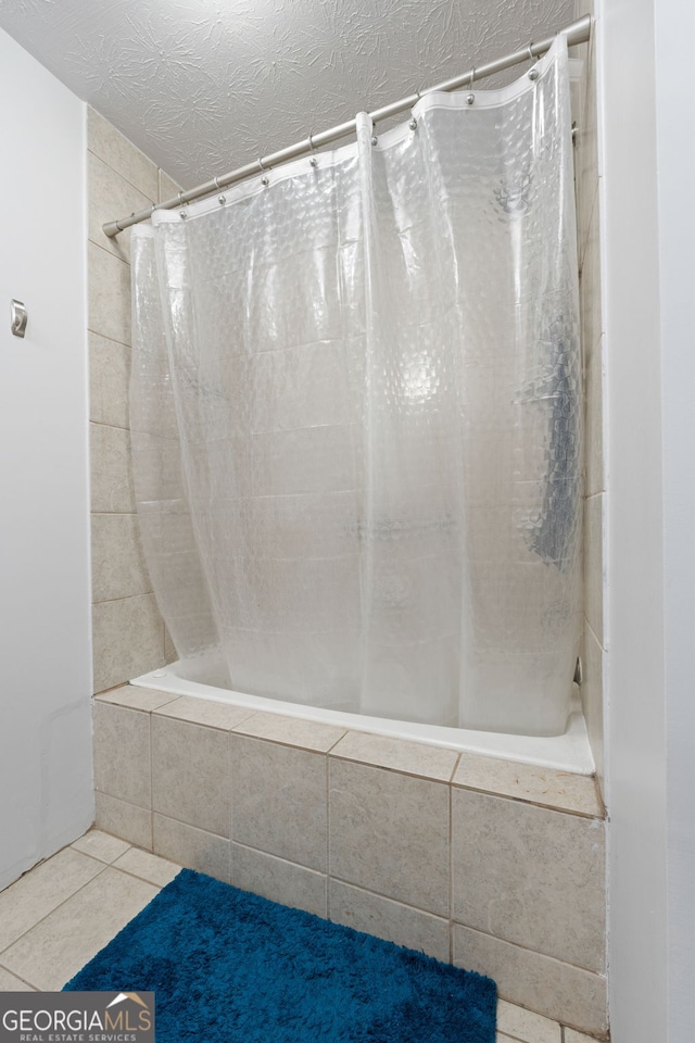 1290 Shadowlawn Dr NE, Conyers, GA 30012 - full bathroom with tiled shower / bath combo and tile patterned floors