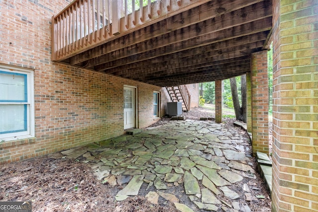 1290 Shadowlawn Dr NE, Conyers, GA 30012 - view of patio with stairs and a wooden deck