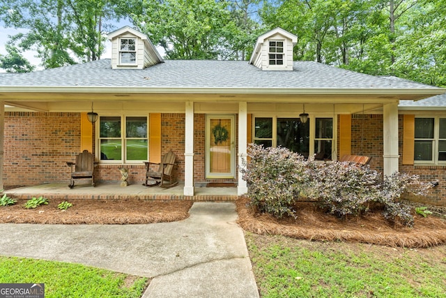 1290 Shadowlawn Dr NE, Conyers, GA 30012 - single story home featuring covered porch, brick siding, and a shingled roof