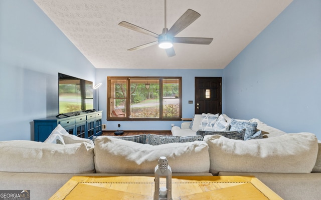 1290 Shadowlawn Dr NE, Conyers, GA 30012 - living area with vaulted ceiling, ceiling fan, and a textured ceiling