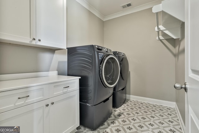 459 N Cove Dr, Newnan, GA 30263 - laundry area with cabinet space, separate washer and dryer, light flooring, and ornamental molding