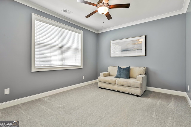 459 N Cove Dr, Newnan, GA 30263 - sitting room featuring ceiling fan, carpet floors, and ornamental molding
