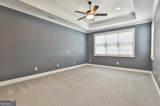 459 N Cove Dr, Newnan, GA 30263 - carpeted spare room featuring a raised ceiling, ceiling fan, and recessed lighting