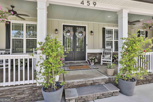 459 N Cove Dr, Newnan, GA 30263 - doorway to property featuring a ceiling fan, a porch, french doors, and board and batten siding