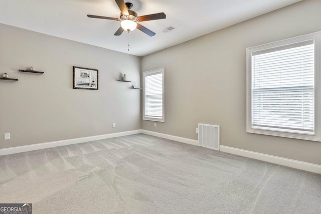 459 N Cove Dr, Newnan, GA 30263 - carpeted empty room featuring a ceiling fan and baseboards