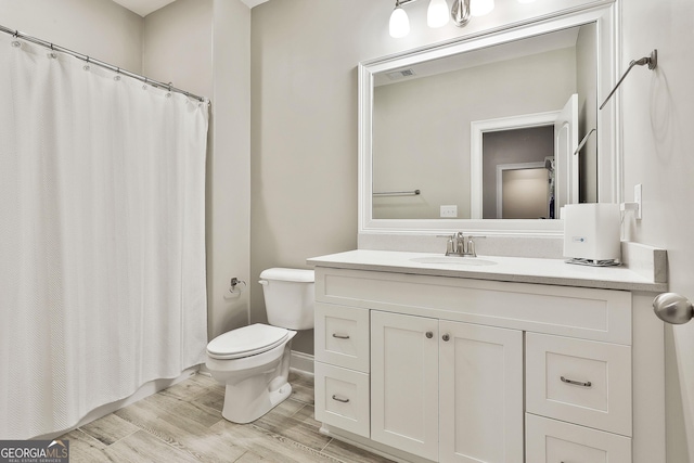 459 N Cove Dr, Newnan, GA 30263 - bathroom with vanity, wood finished floors, and a shower with shower curtain
