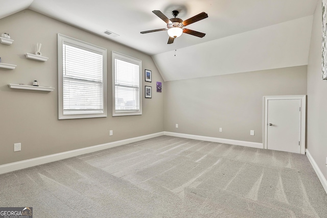 459 N Cove Dr, Newnan, GA 30263 - bonus room with vaulted ceiling, ceiling fan, and carpet flooring