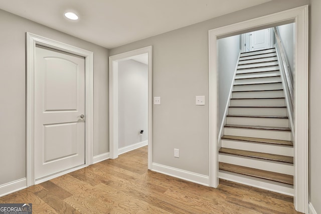 459 N Cove Dr, Newnan, GA 30263 - stairs featuring wood finished floors and recessed lighting
