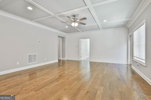 459 N Cove Dr, Newnan, GA 30263 - empty room with coffered ceiling, ceiling fan, recessed lighting, beamed ceiling, and wood finished floors