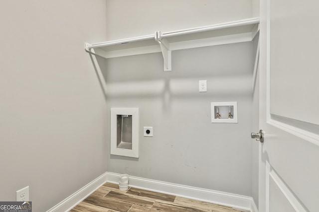 459 N Cove Dr, Newnan, GA 30263 - washroom with hookup for an electric dryer, washer hookup, and wood finished floors