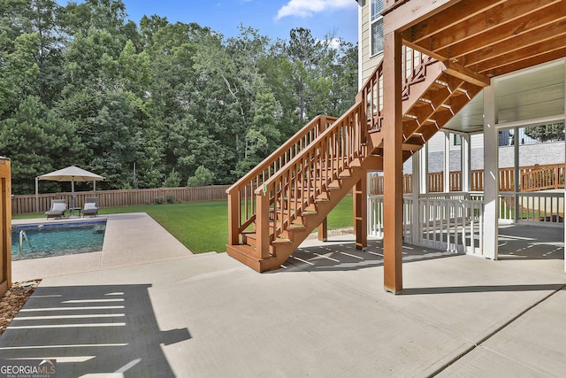 459 N Cove Dr, Newnan, GA 30263 - fenced backyard with a patio and stairs
