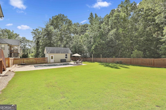 459 N Cove Dr, Newnan, GA 30263 - fenced backyard with an outbuilding and a patio
