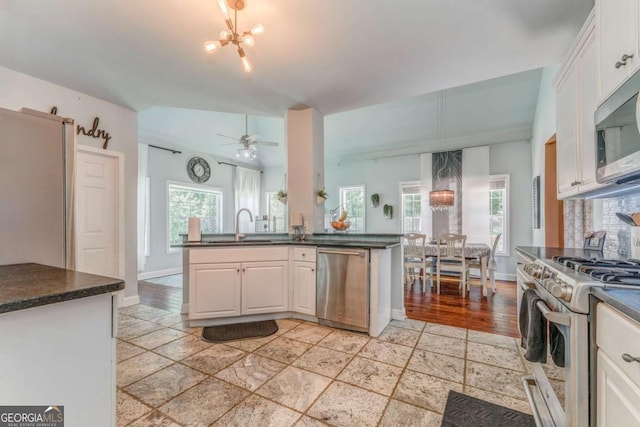 119 Creekside Vw, Hiram, GA 30141 - kitchen featuring appliances with stainless steel finishes, a chandelier, white cabinetry, and ceiling fan