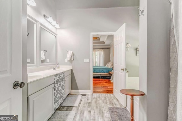 119 Creekside Vw, Hiram, GA 30141 - ensuite bathroom featuring wood finished floors and double vanity