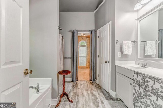 119 Creekside Vw, Hiram, GA 30141 - full bath featuring vanity, wood finished floors, and a bath