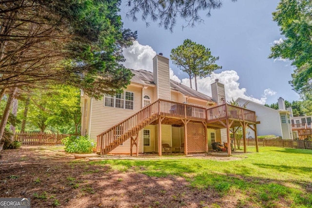 119 Creekside Vw, Hiram, GA 30141 - back of property with a chimney, a wooden deck, and stairway