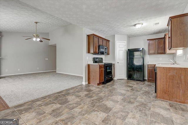 2898 Cedar Trace Dr, Ellenwood, GA 30294 - kitchen with black appliances, a ceiling fan, light countertops, open floor plan, and a textured ceiling