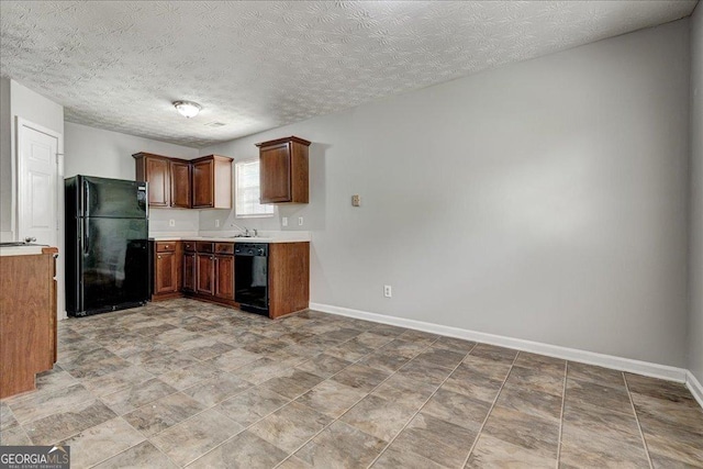 2898 Cedar Trace Dr, Ellenwood, GA 30294 - kitchen with black appliances and light countertops