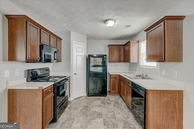 2898 Cedar Trace Dr, Ellenwood, GA 30294 - kitchen featuring black appliances, light countertops, and brown cabinetry