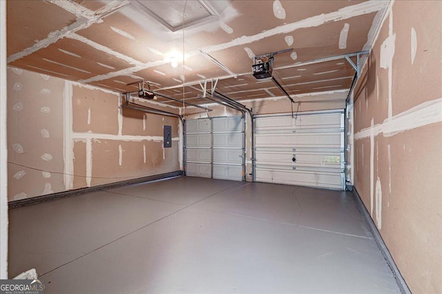 2898 Cedar Trace Dr, Ellenwood, GA 30294 - garage featuring electric panel and a garage door opener