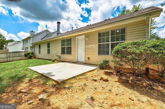 2898 Cedar Trace Dr, Ellenwood, GA 30294 - back of property with a patio area