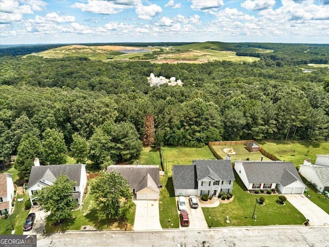 2898 Cedar Trace Dr, Ellenwood, GA 30294 - aerial perspective of suburban area featuring a heavily wooded area