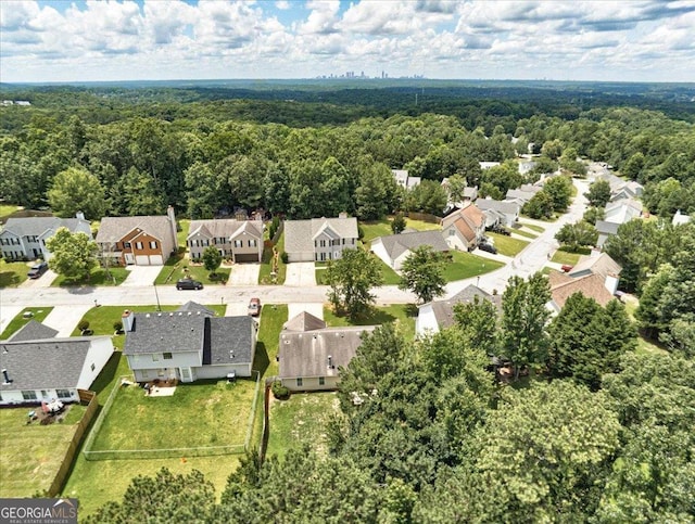 2898 Cedar Trace Dr, Ellenwood, GA 30294 - aerial perspective of suburban area featuring a heavily wooded area