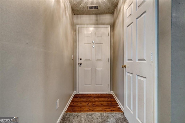2898 Cedar Trace Dr, Ellenwood, GA 30294 - doorway to outside featuring wood finished floors and baseboards