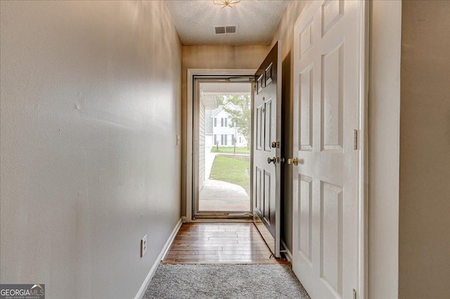 2898 Cedar Trace Dr, Ellenwood, GA 30294 - entryway featuring baseboards and wood finished floors