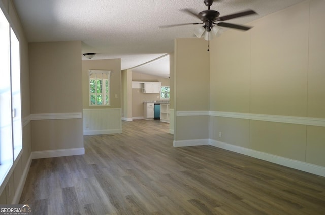 325 High Rd, Forsyth, GA 31029 - spare room featuring wood finished floors, ceiling fan, and a textured ceiling