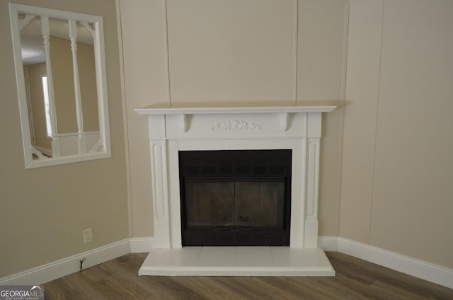 325 High Rd, Forsyth, GA 31029 - detailed view of wood finished floors and a glass covered fireplace