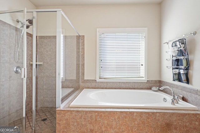 218 Ballymore Ln, Acworth, GA 30102 - full bath with plenty of natural light, a shower stall, and a garden tub