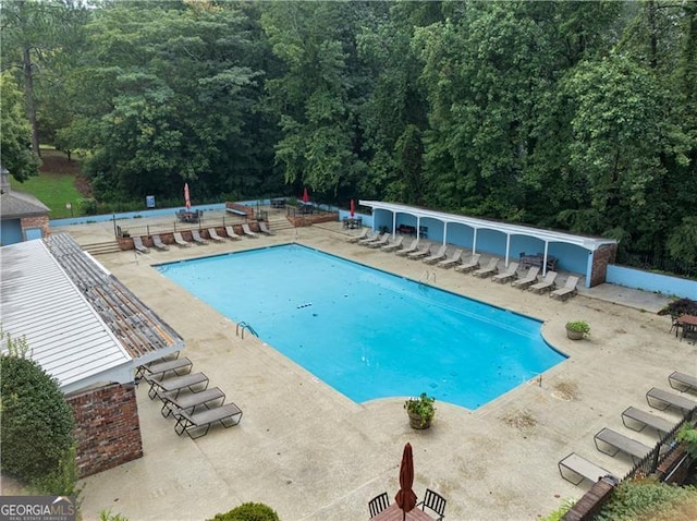 3091 Colonial Way Unit E4, Chamblee, GA 30341 - community pool with a patio and a forest view