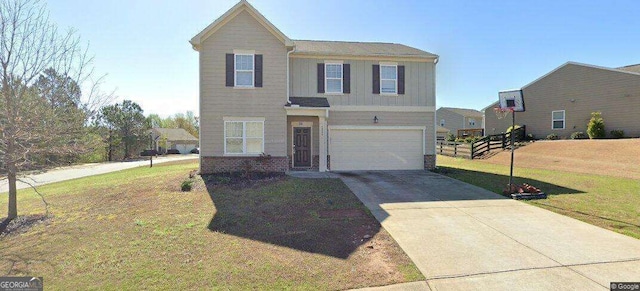 4505 Chandler Dr, Cumming, GA 30028 - traditional-style home with a garage, board and batten siding, concrete driveway, and a front yard