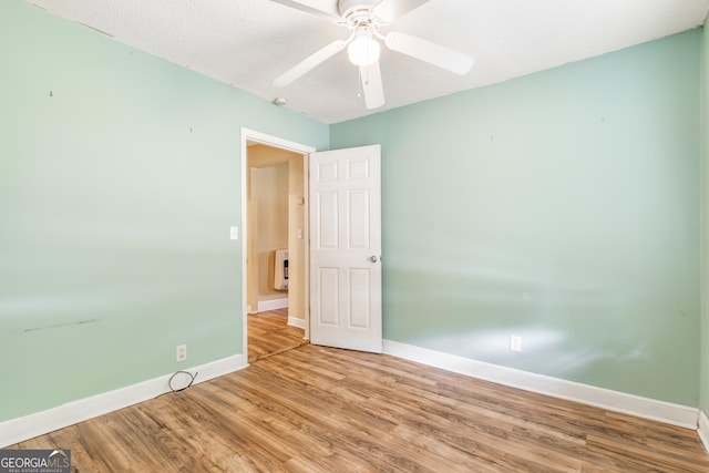 712 Moore Ave, Lafayette, GA 30728 - unfurnished room featuring wood finished floors and ceiling fan