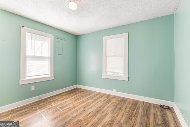 712 Moore Ave, Lafayette, GA 30728 - unfurnished room with wood finished floors and a textured ceiling