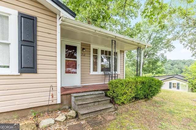 712 Moore Ave, Lafayette, GA 30728 - view of exterior entry with a porch