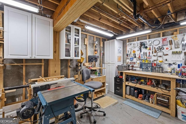 7615 Laurel Oak Dr, Suwanee, GA 30024 - unfinished below grade area featuring a workshop area